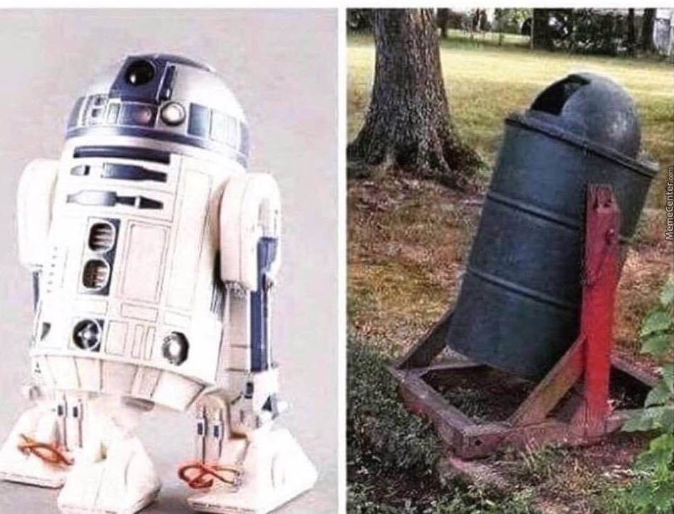 Comparison of R2 on the left and a similarly designed park bin: a tubular shape with a domed top supported by red metal frame on either side; it is tipped back a few degrees to match the angle